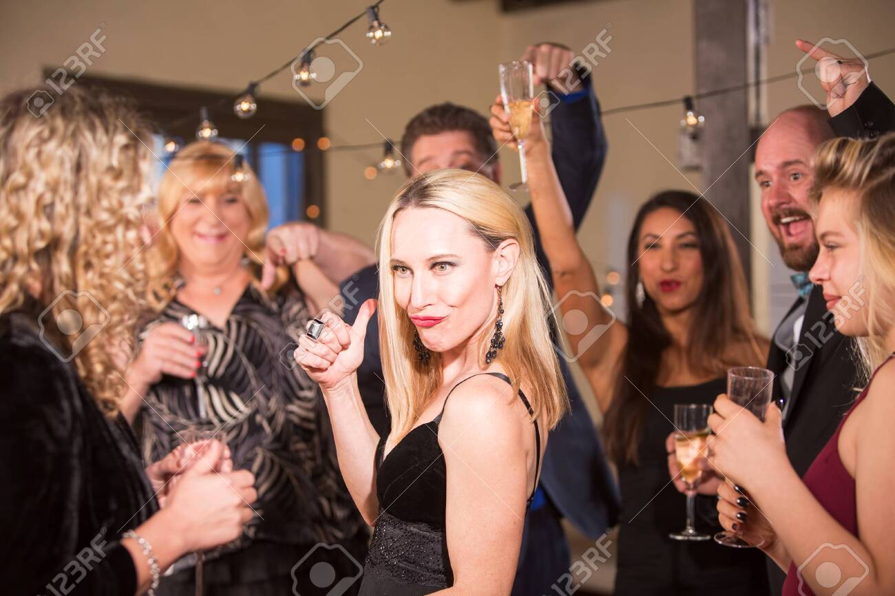 Scott Griessel / CreatistaFunny Mature Woman At A Party Or