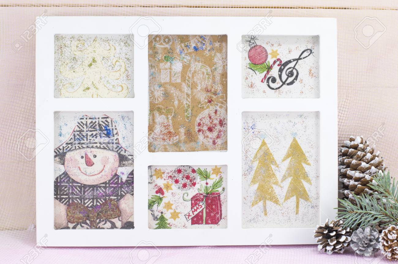 Homemade decoupage Christmas decorations in a photo frame. Celebrating..