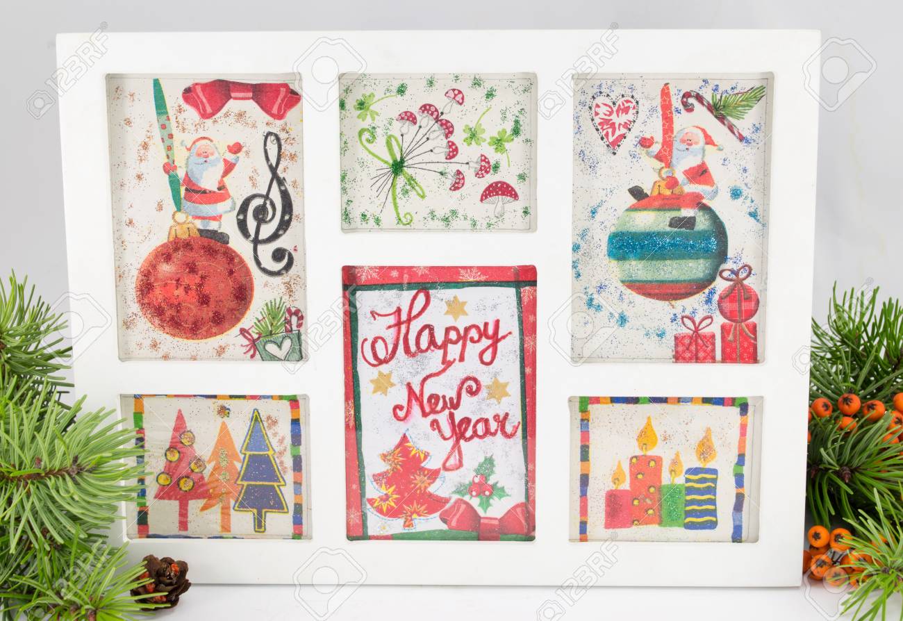 Decoupage New Year decorations made of paper in a frame