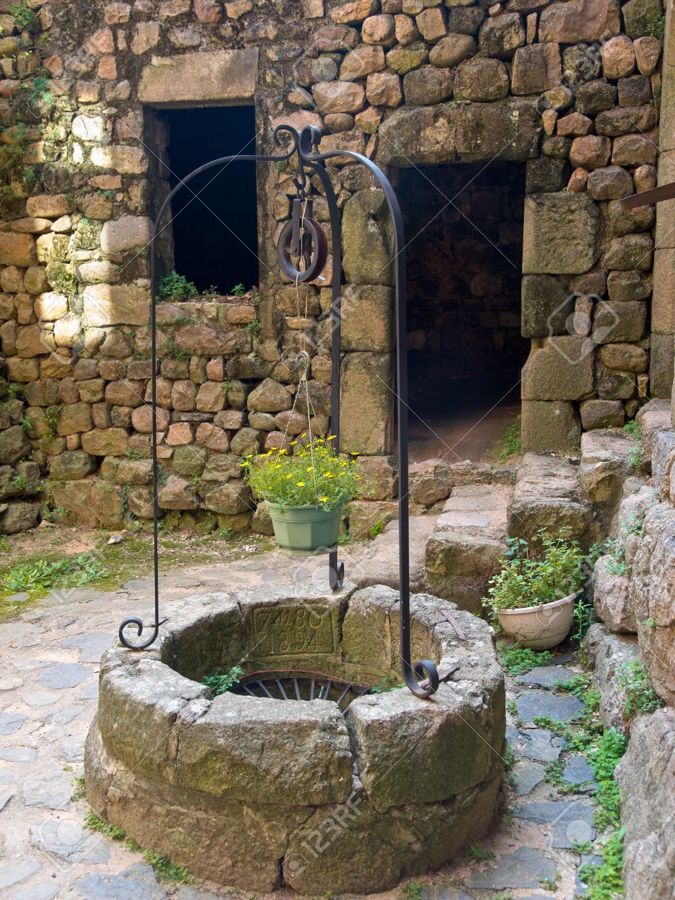Old Wishing Draw Well In A Gothic Style Castle In France Stock Old Wishing Draw Well In A Gothic Style Castle In France Stock