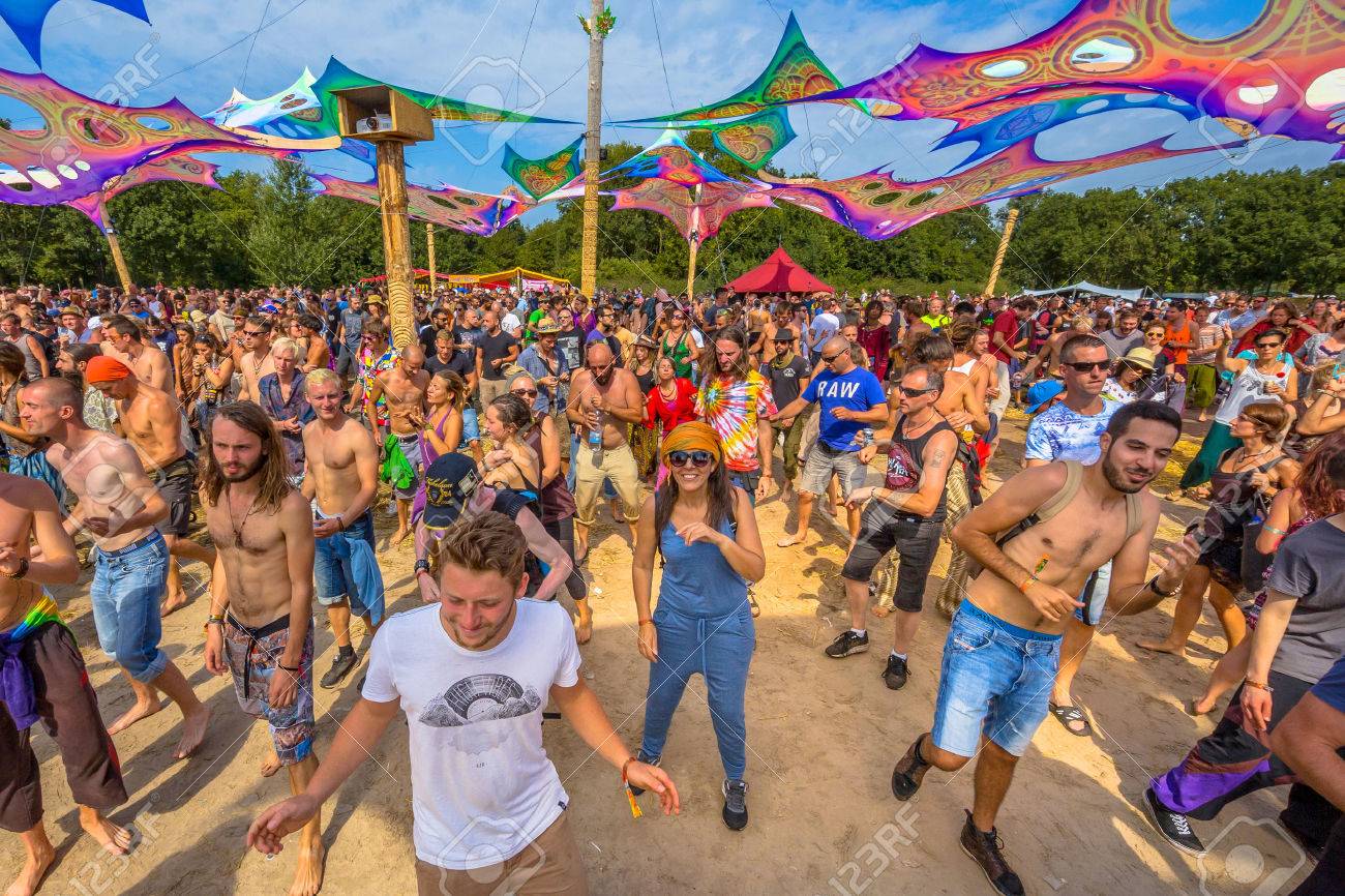 LEEUWARDEN, NETHERLANDS-AUGUST 30, 2015: Laughing happy party people having fun on the dance floor at Psy-Fi open air psychedelic trance music Festival - 52112969 LEEUWARDEN, NETHERLANDS-AUGUST 30, 2015: Laughing happy party people having fun on the dance floor at Psy-Fi open air psychedelic trance music Festival - 52112969