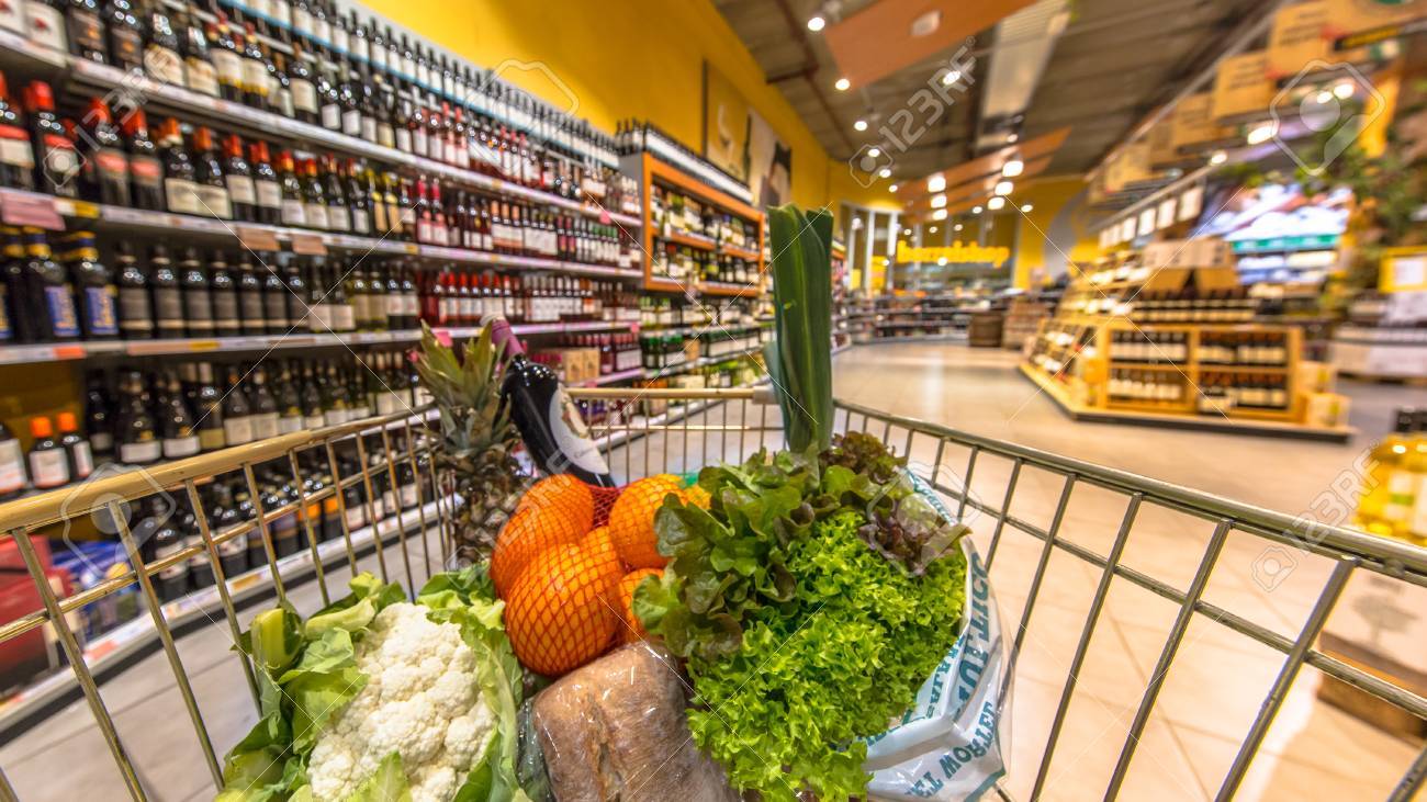 Grocery Cart At A Supermarket Aisle Filled Up With Healthy Food - 1300x731 - jpeg View From Above Of A Grocery Store Aisle