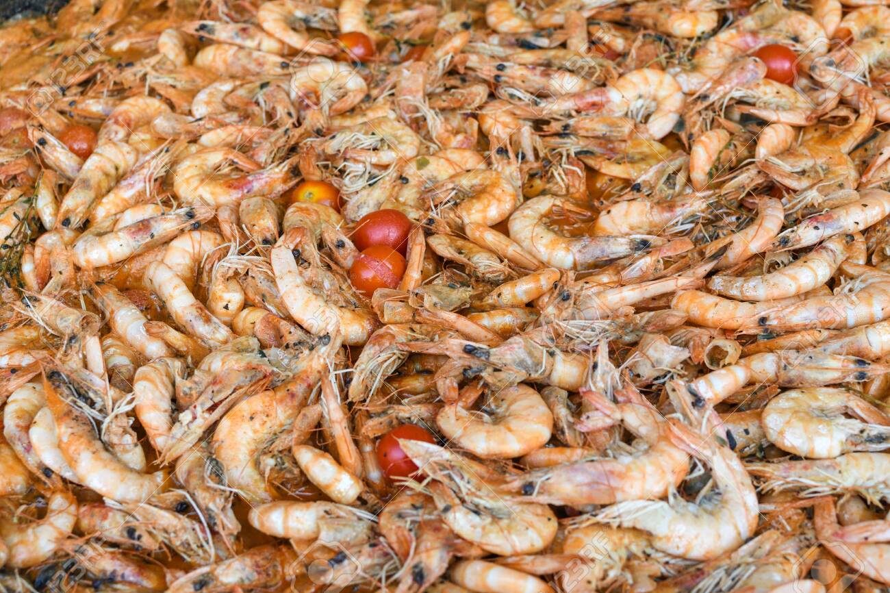 Boiled Crawfish, Fried Crawfish, Crawfish étouffée, Crawfish Beignets. Crayfish Or Crawdads, Crawdaddies During Fish Market Street Food Festival. Cooked Being Prepared In A Large Wok Pan Stock Photo, Picture And Royalty Free