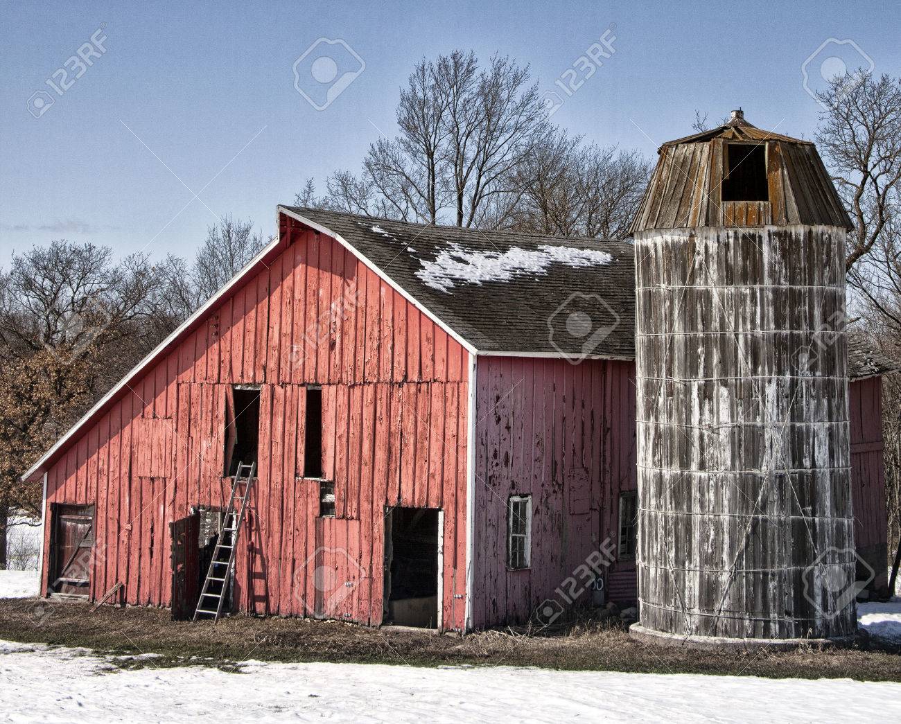 landscape springtime image of an old farmstead with weathered