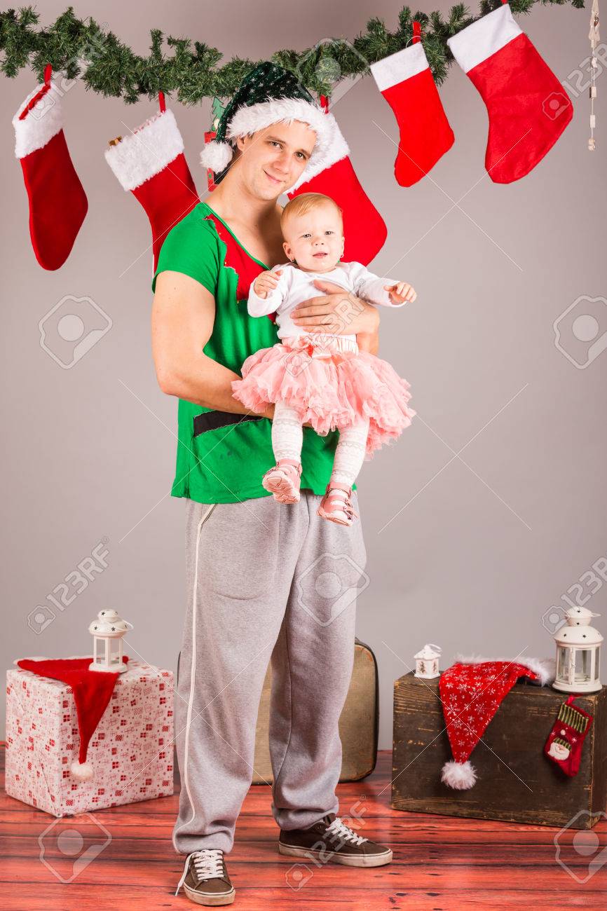 Funny Christmas Elf With Baby Girl In Studio Stock Photo 69144795 Funny Christmas Elf With Baby Girl In Studio Stock Photo 69144795