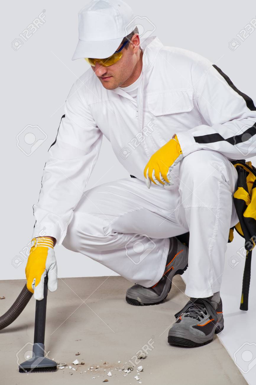 Cleaning Cement Floor With Vacuum Cleaner Stock Photo Picture And
