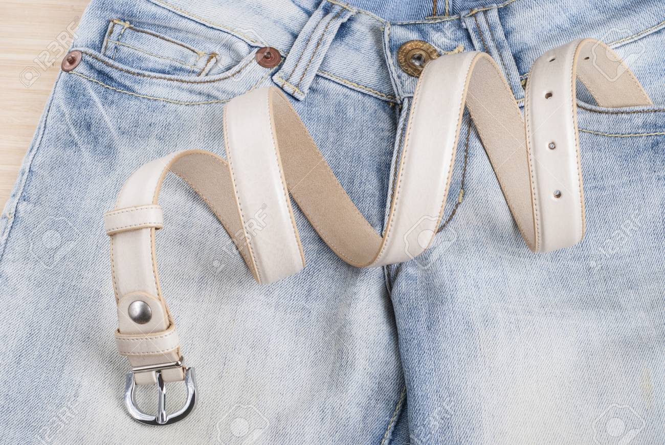 women's jeans on the table and collapsed belt - 44238563 women's jeans on the table and collapsed belt - 44238563