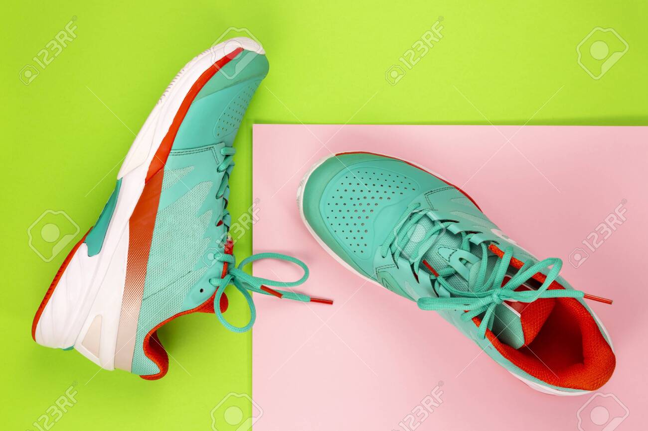 pink and green tennis shoes