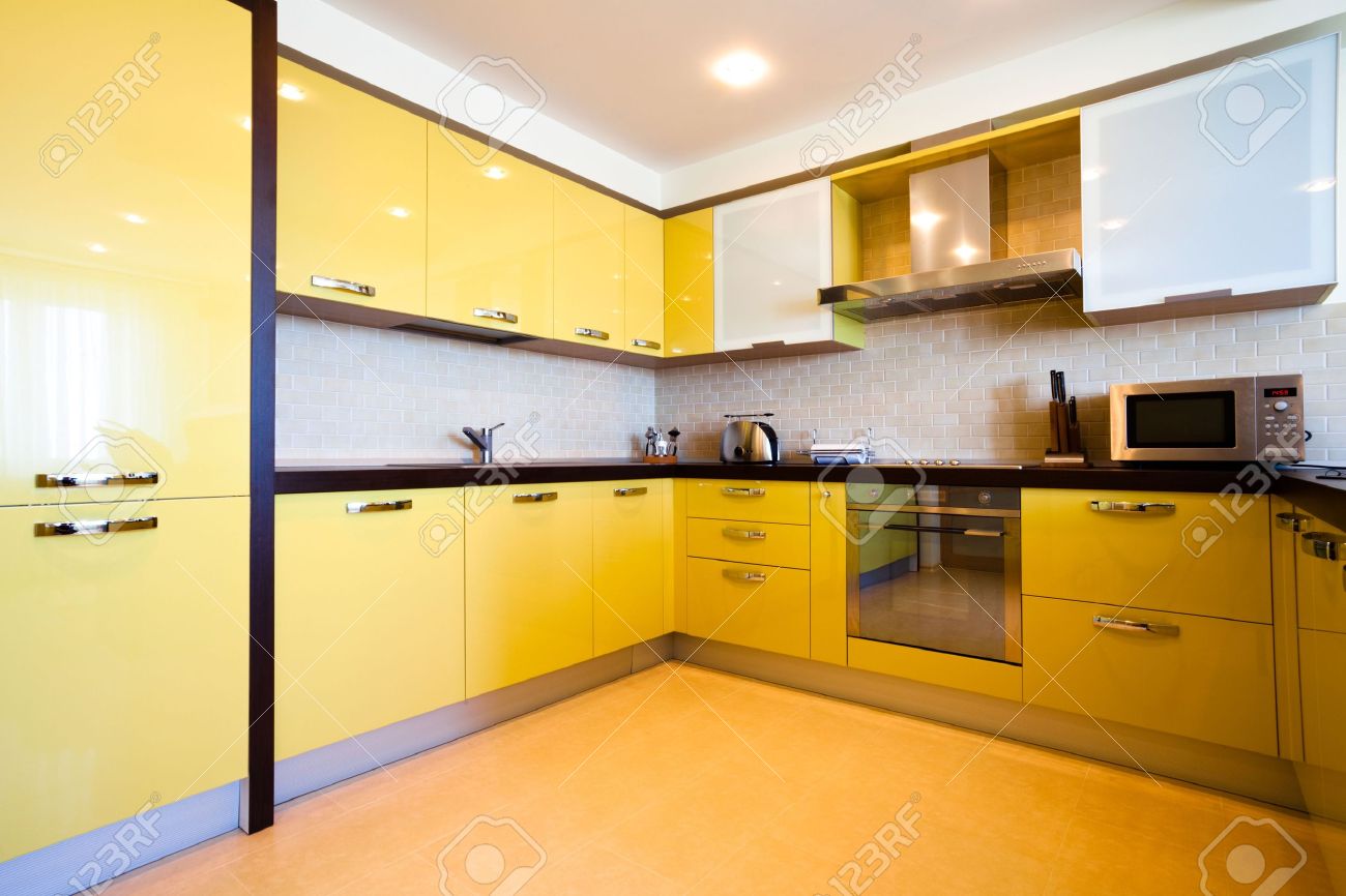 Yellow Kitchen Interior In Modern Flat Stock Photo Picture And Royalty Free Image Image 4762730