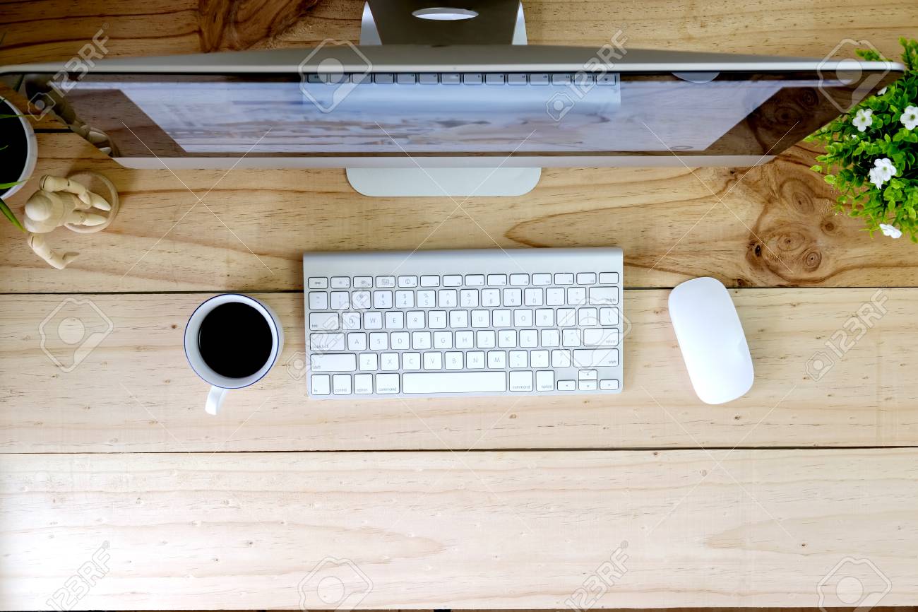 workspace modern desktop computer on wood table and office stuff ofice stuff