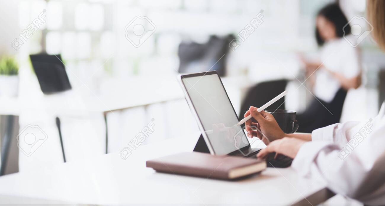 Professional Female Startup Working On Her Project With Tablet Stock Photo Picture And Royalty Free Image Image 128377844 professional female startup working on her project with tablet
