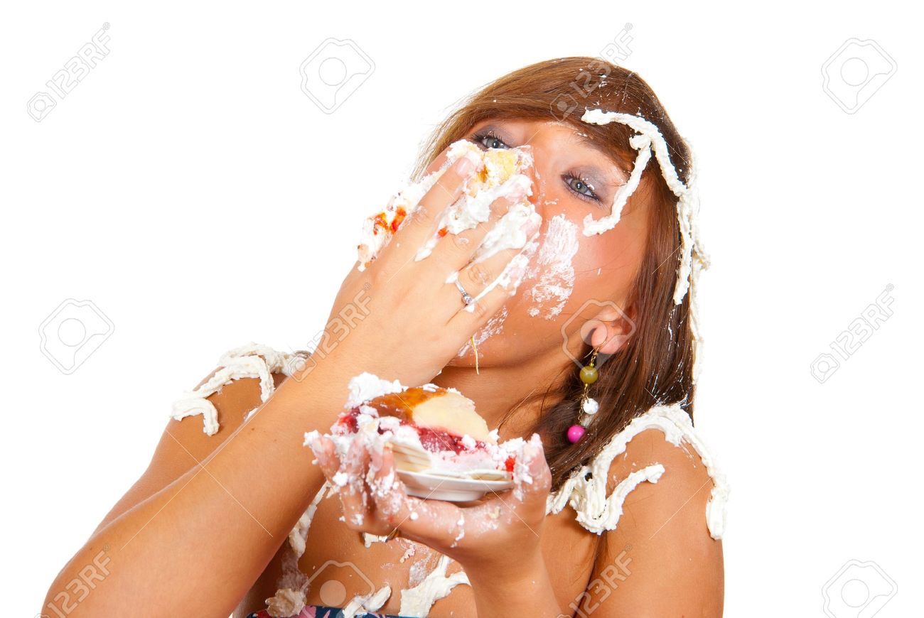 7314702-Girl-eating-cake-with-his-hands-her-face-and-head-stained-cream--Stock-Photo.jpg