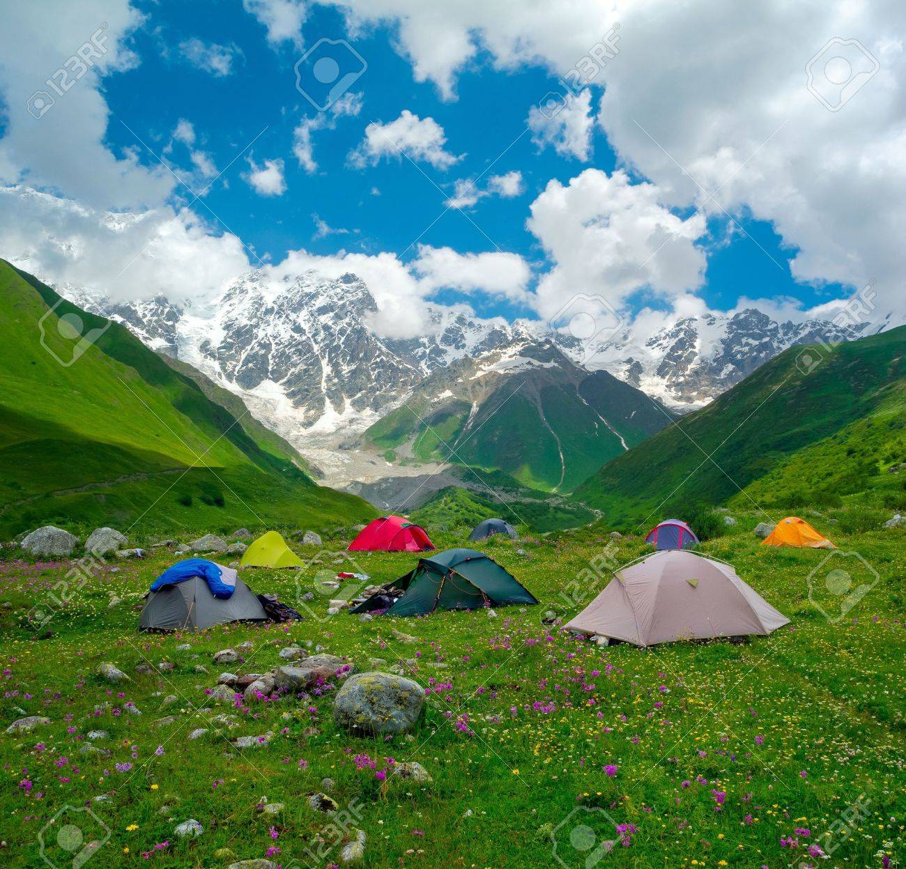 Hikers camp near Ushguli, Svaneti, Georgia. Shkhara mountain in the background - 21023319 Hikers camp near Ushguli, Svaneti, Georgia. Shkhara mountain in the background - 21023319