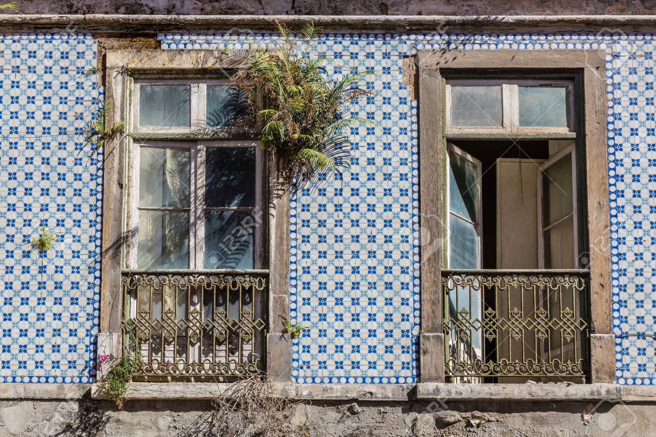 Typical Decoration Of The Facade Of The House In Lisbon. Traditional Ceramic Tiles Azulejos. Stock Photo, Picture and Royalty Free Image. Image 80938009.