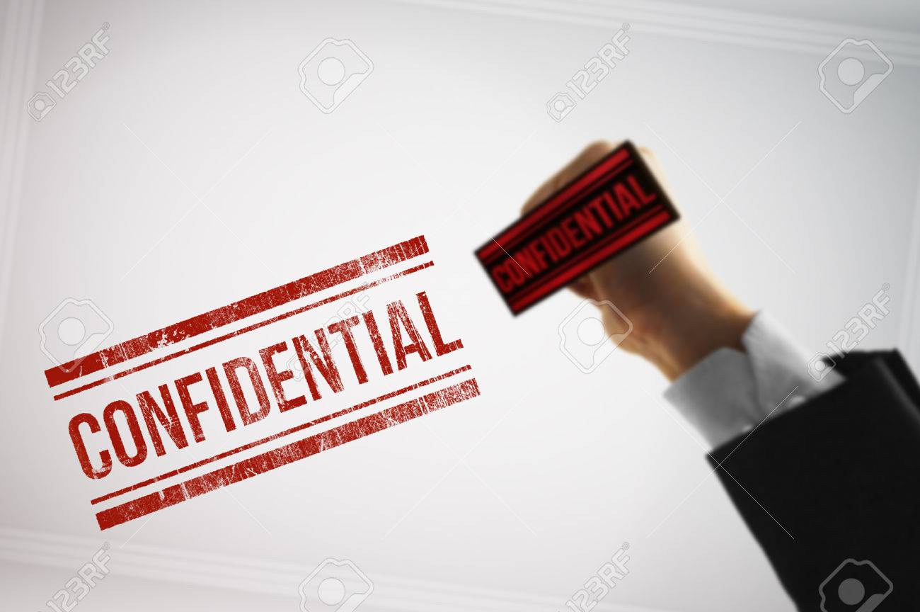 Confidential Rubber Stamp Seen From The Point Of View Of A File Inside A Restricted Confidential Rubber Stamp Seen From The Point Of View Of A File Inside A Restricted