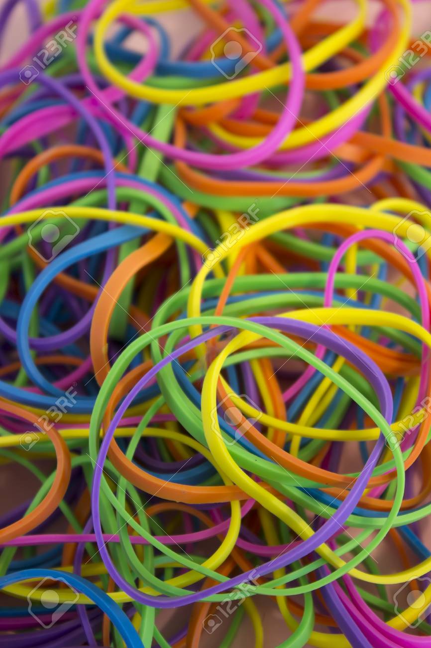 This Is A Photograph Of A Pile Neon Colored Elastic Rubber Bands