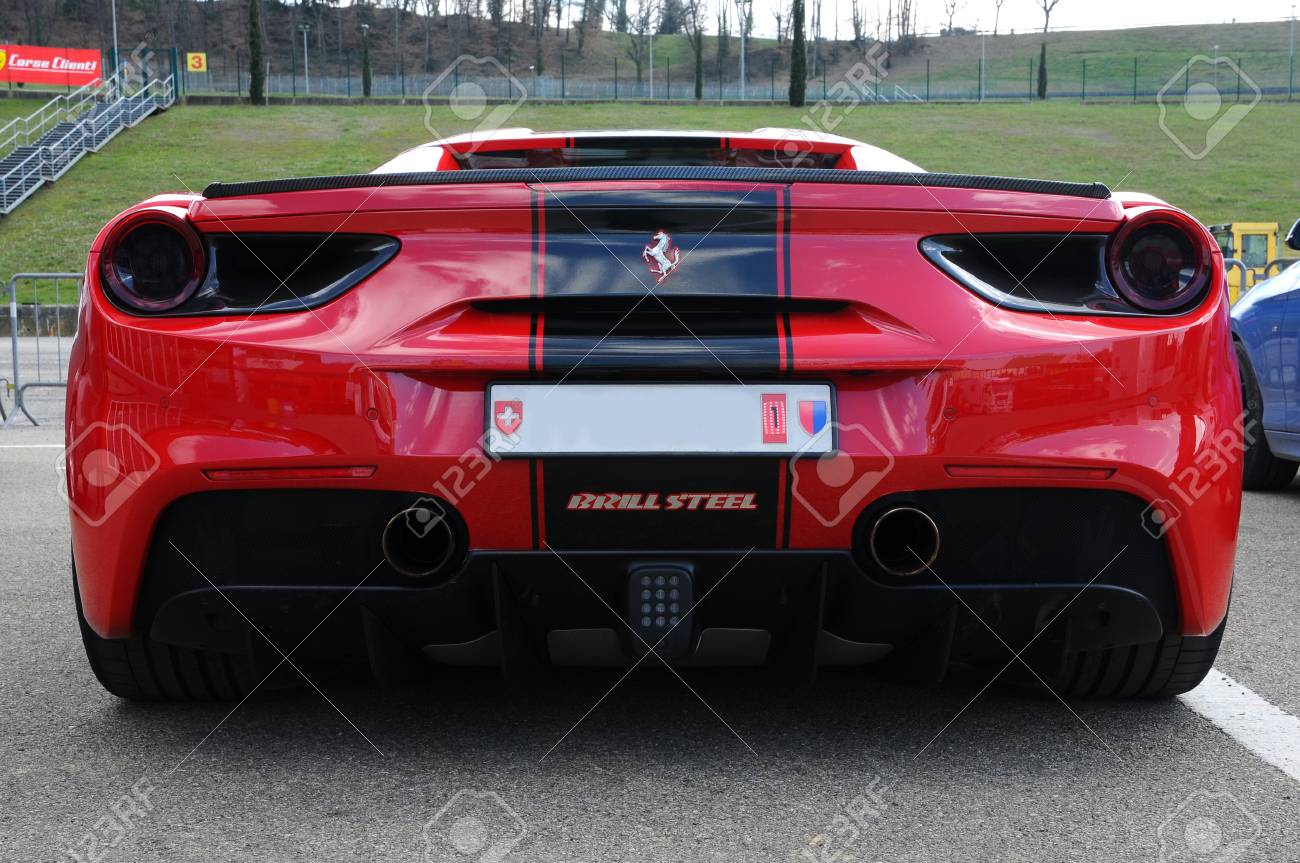 Scarperia (Florence), Italy - March 2018: Ferrari car in the.. Scarperia (Florence), Italy - March 2018: Ferrari car in the..