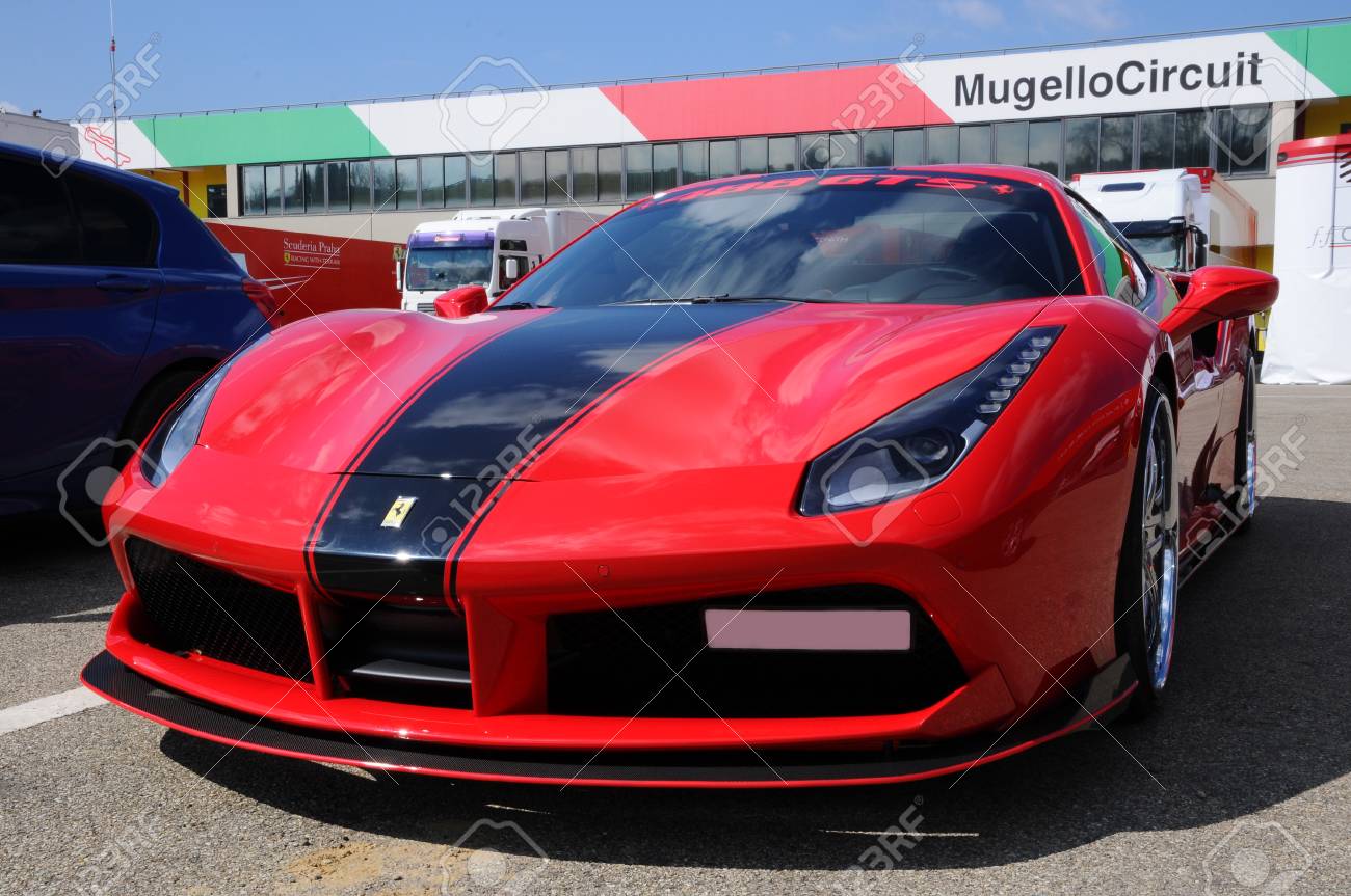 Scarperia (Florence), Italy - March 2018: Ferrari car in the.. Scarperia (Florence), Italy - March 2018: Ferrari car in the..