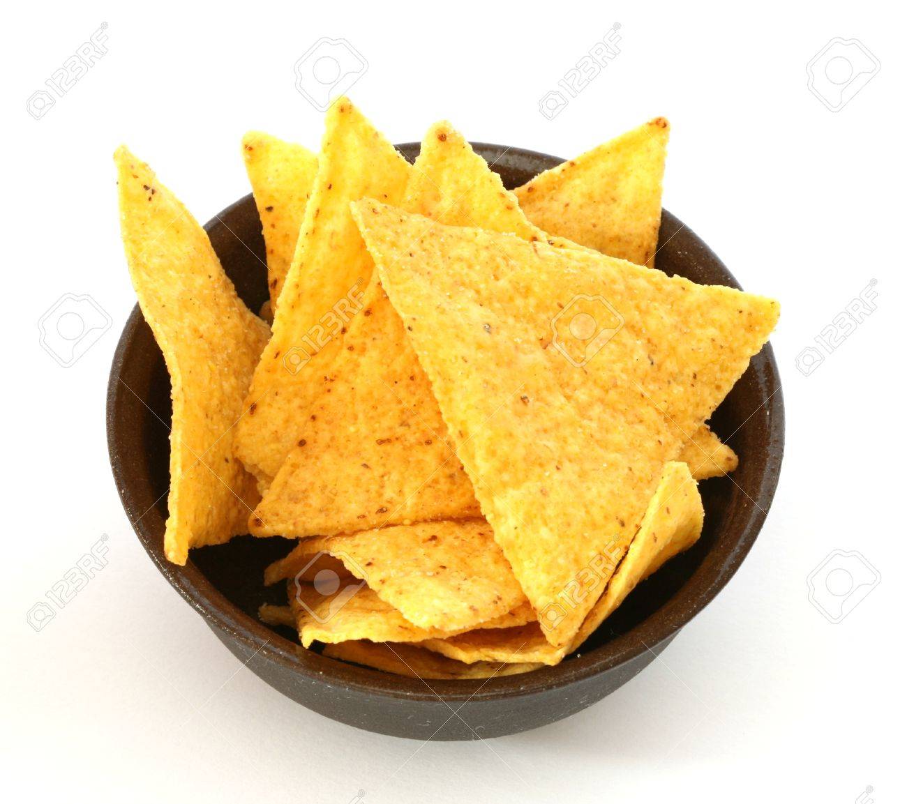Mexican Tortilla Chips In Brown Bowl On White Background Stock Photo,  Picture And Royalty Free Image. Image 11418917.