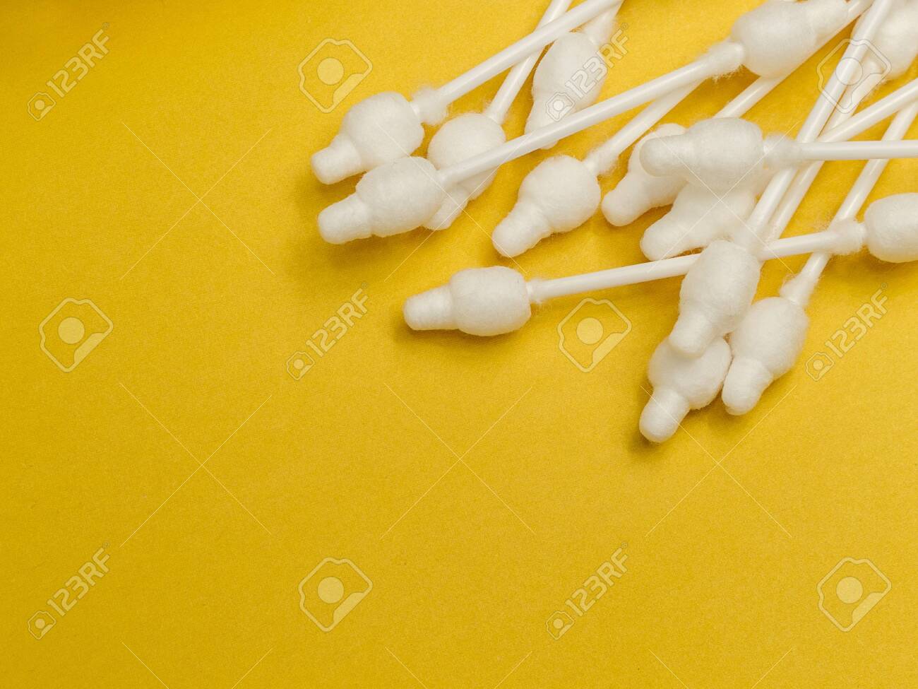 Download Cotton Buds Close Up On A Light Yellow Background For Children Stock Photo Picture And Royalty Free Image Image 140647797 Yellowimages Mockups
