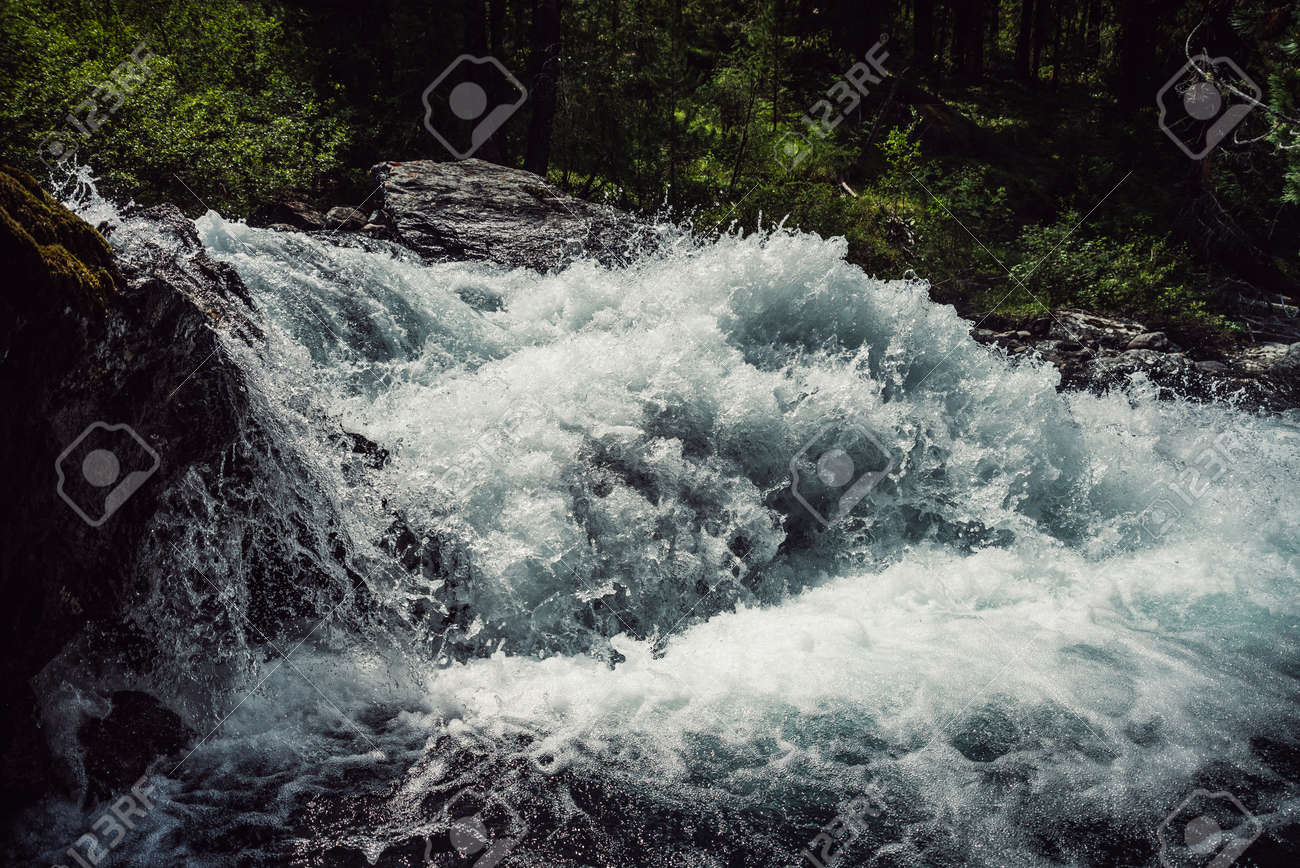 Big rapids of powerful mountain river. Beautiful background with azure water in fast river. Frozen motion of tall mountain river rapids. Power majestic nature of highlands. Backdrop of aqua turbulence - 170494866 Big rapids of powerful mountain river. Beautiful background with azure water in fast river. Frozen motion of tall mountain river rapids. Power majestic nature of highlands. Backdrop of aqua turbulence - 170494866