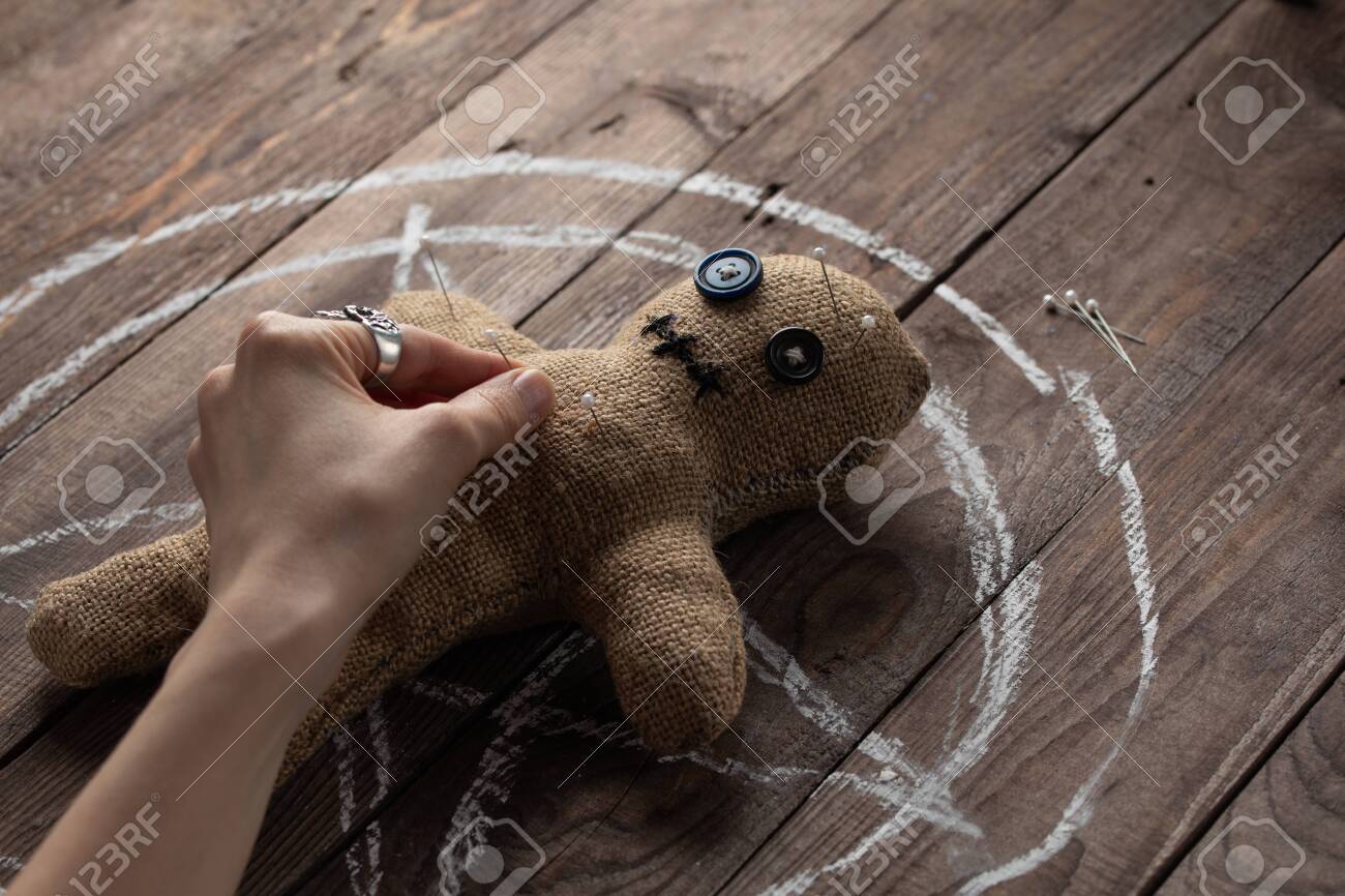 wooden voodoo doll