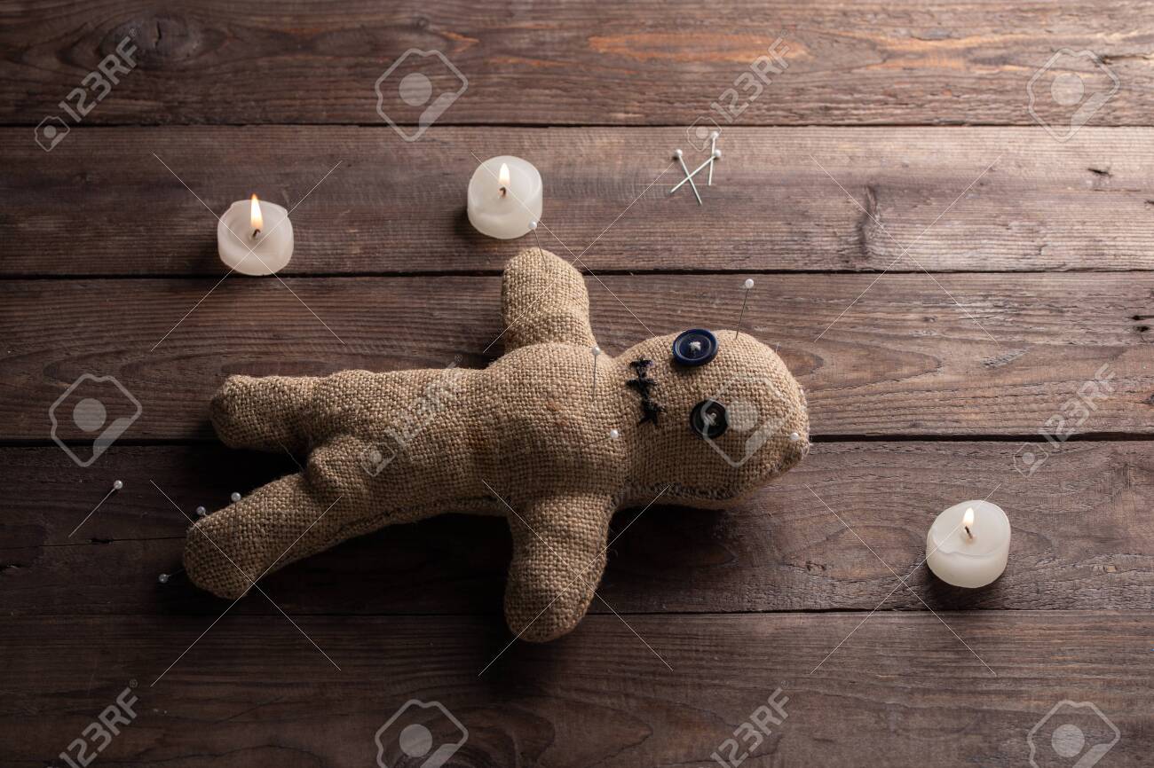 wooden voodoo doll