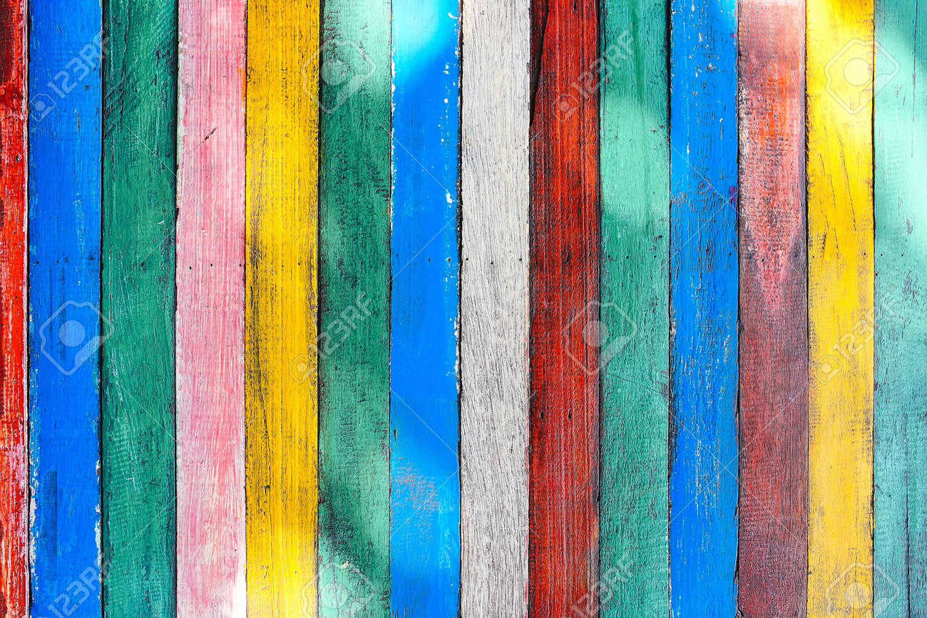 Mulricolored wooden table board surface background or wallpaper. Thin colorful vertical rough boards with knife marks - 166116395 Mulricolored wooden table board surface background or wallpaper. Thin colorful vertical rough boards with knife marks - 166116395