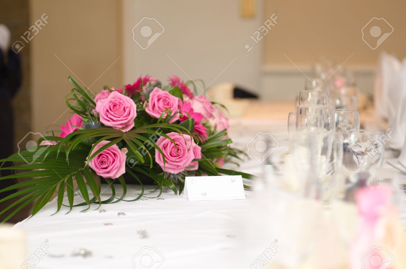 an empty blank paper table card name plate sign on a wedding stock