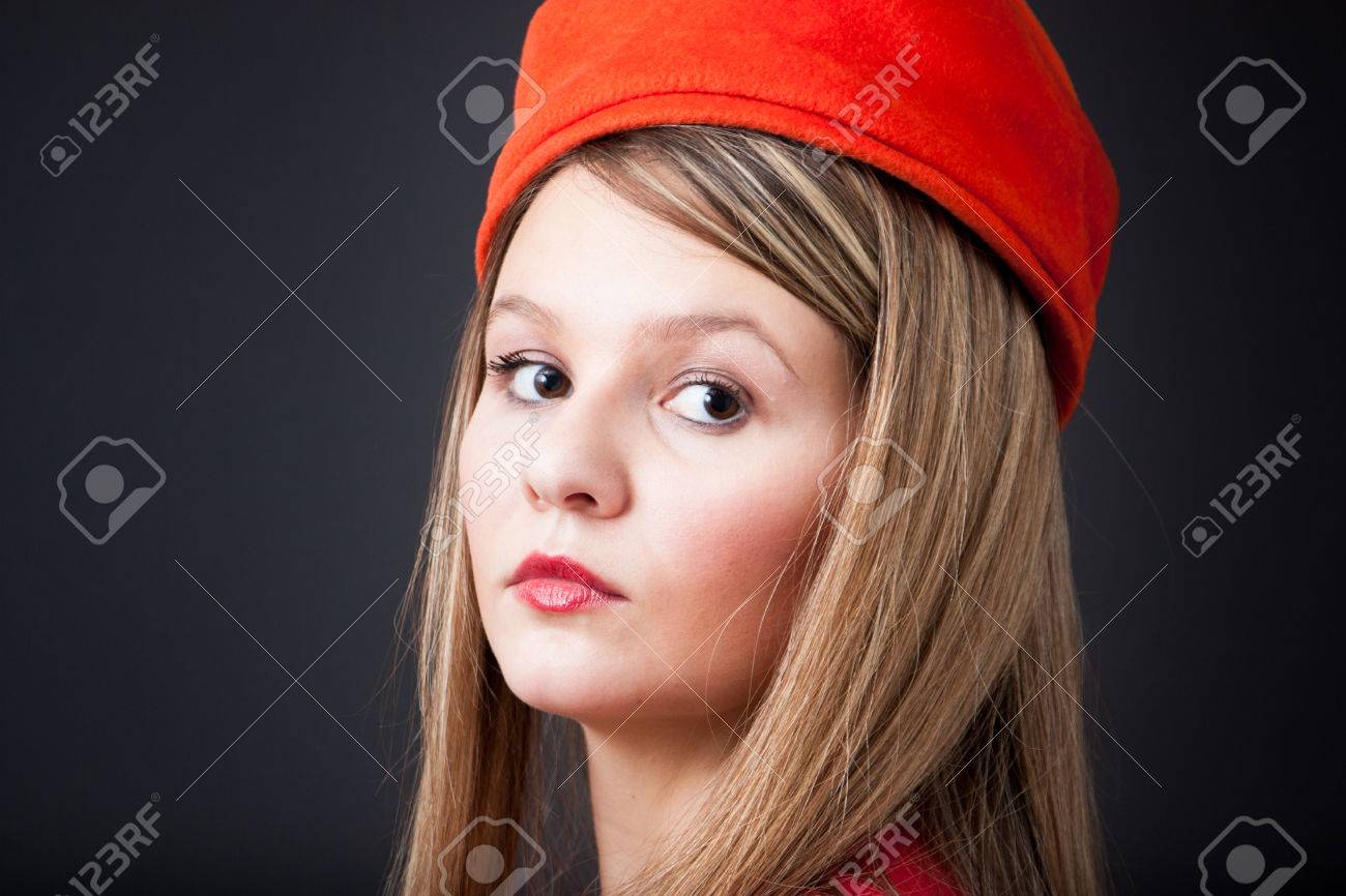 orange pillbox hat