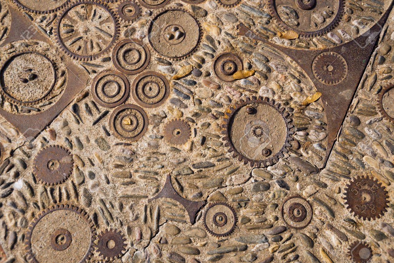 Stone Wall Art art background from stone, rusty gear wheel on the wall stock Stone Wall Art art background from stone, rusty gear wheel on the wall stock