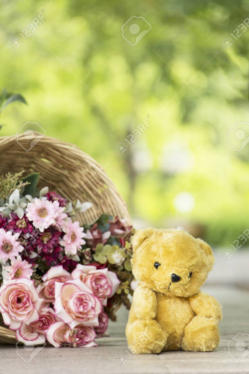 beautiful flowers with teddy bear