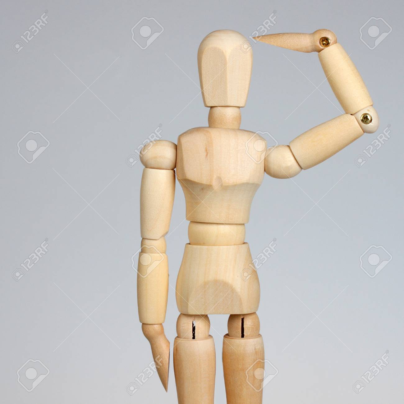 wooden mannequin saluting stock photo picture and royalty free