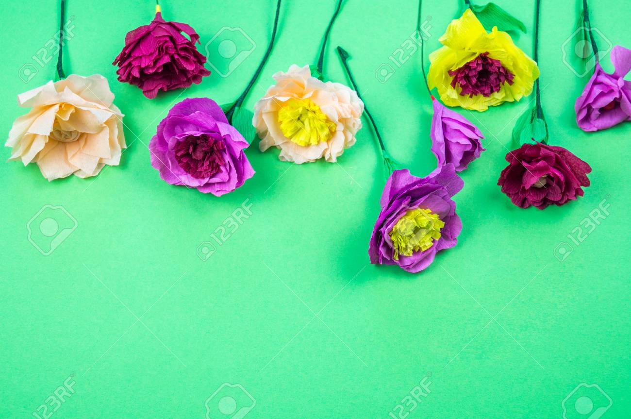 utensils and tools for making crepe paper flowers on green paper flower making tools