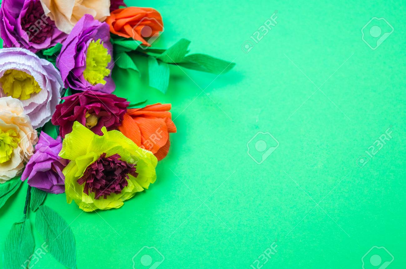utensils and tools for making crepe paper flowers on green paper flower making tools