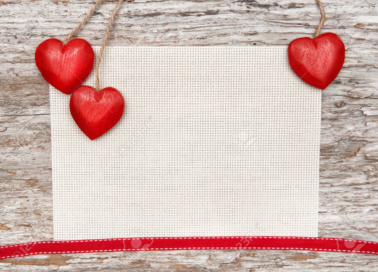 Valentine Card With Hearts On Canvas And Old Wood Background Stock Photo,  Picture and Royalty Free Image. Image 24520029., image size:1300x935