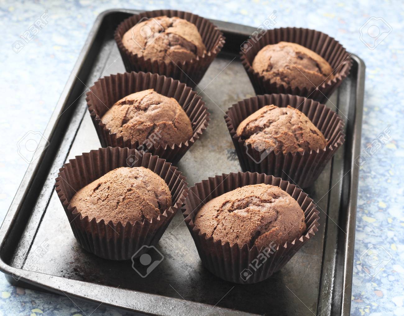 Home Made Chocolate Cupcakes Straight From The Oven On A Metal Tray Stock Photo Picture And Royalty Free Image Image