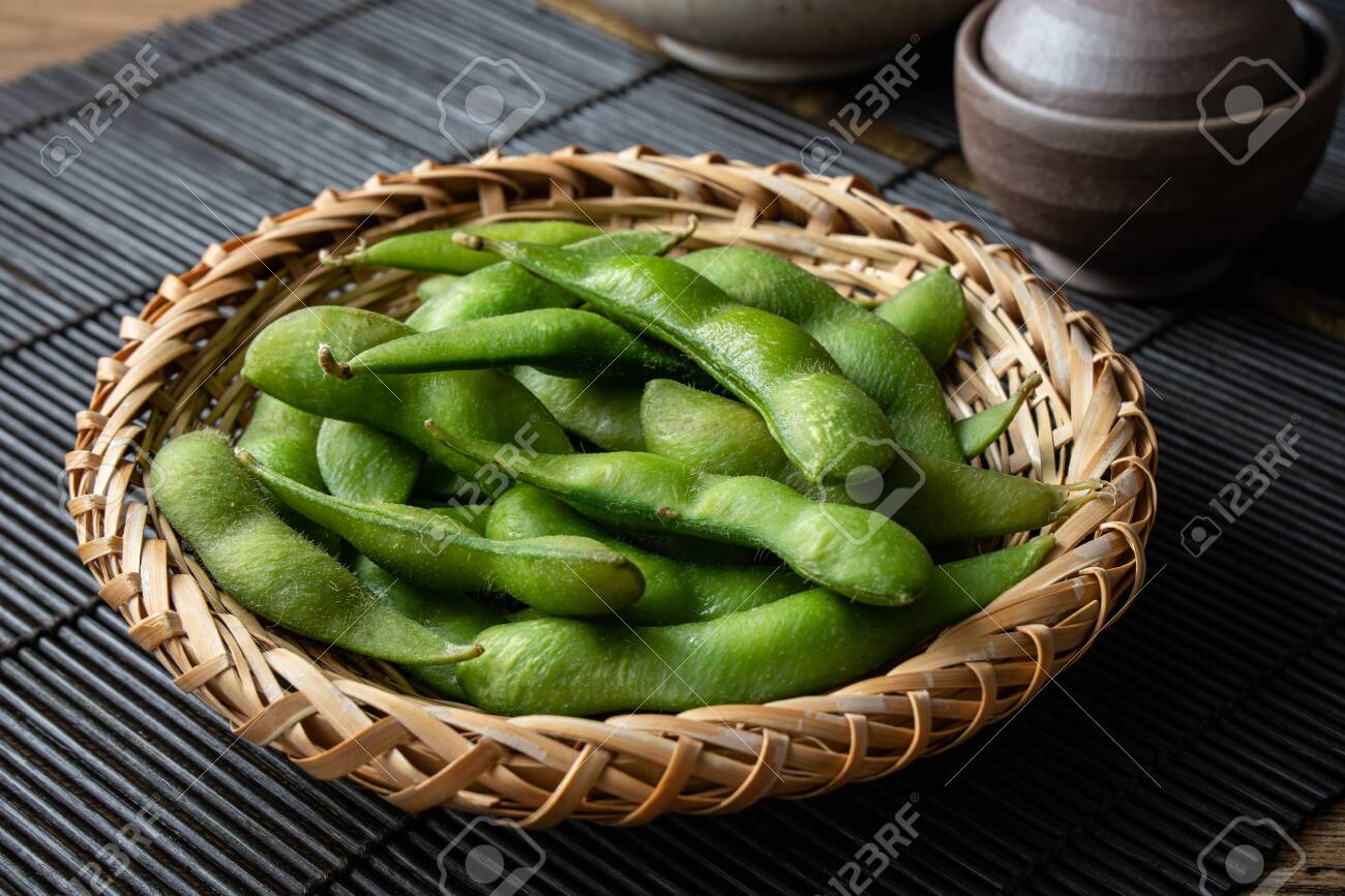 Edamame, a type of bean often eaten as an appetizer or snack in Japanese cuisine. - 149445894 Edamame, a type of bean often eaten as an appetizer or snack in Japanese cuisine. - 149445894