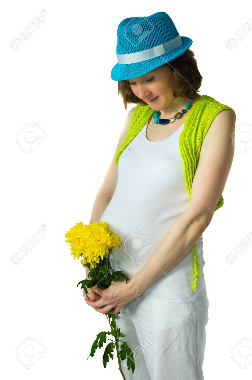 黄色の花とスタジオのアダルト妊婦 の写真素材 画像素材 Image