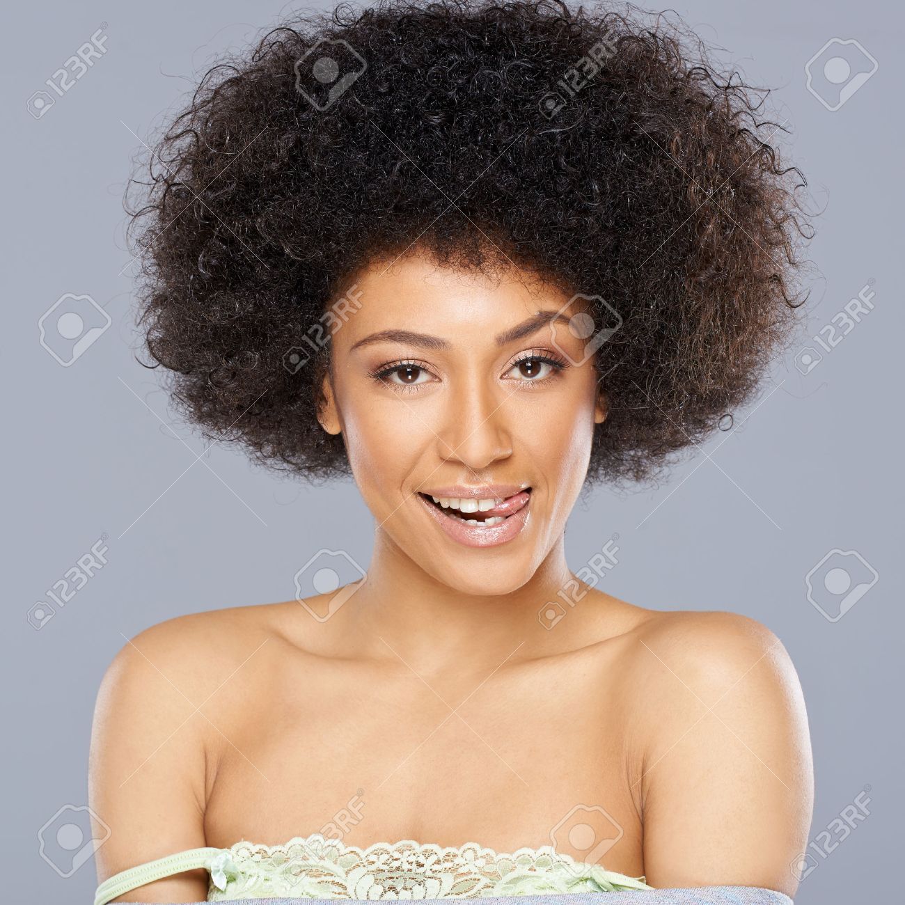 Pretty African American Woman With A Lovely Smile And A Cute