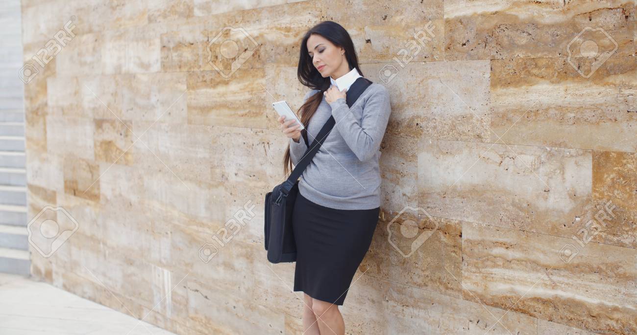 grey sweater black skirt