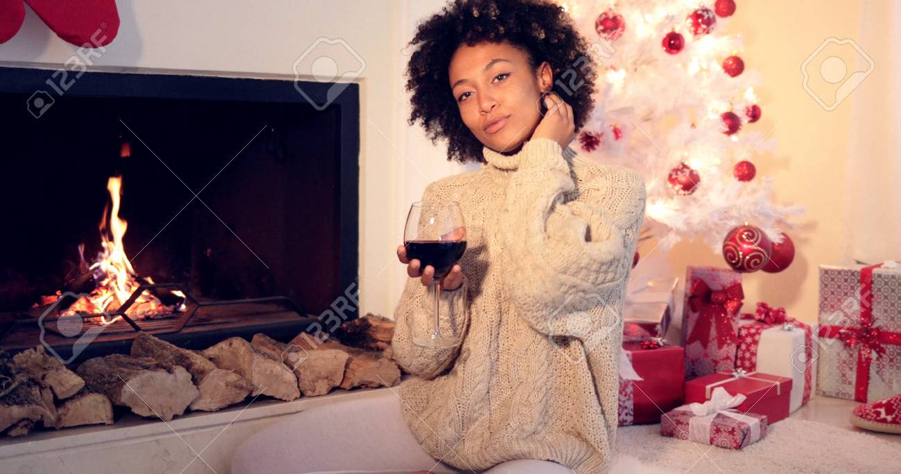 Pretty African American Woman With Huge Afro Haircut Holds Glass