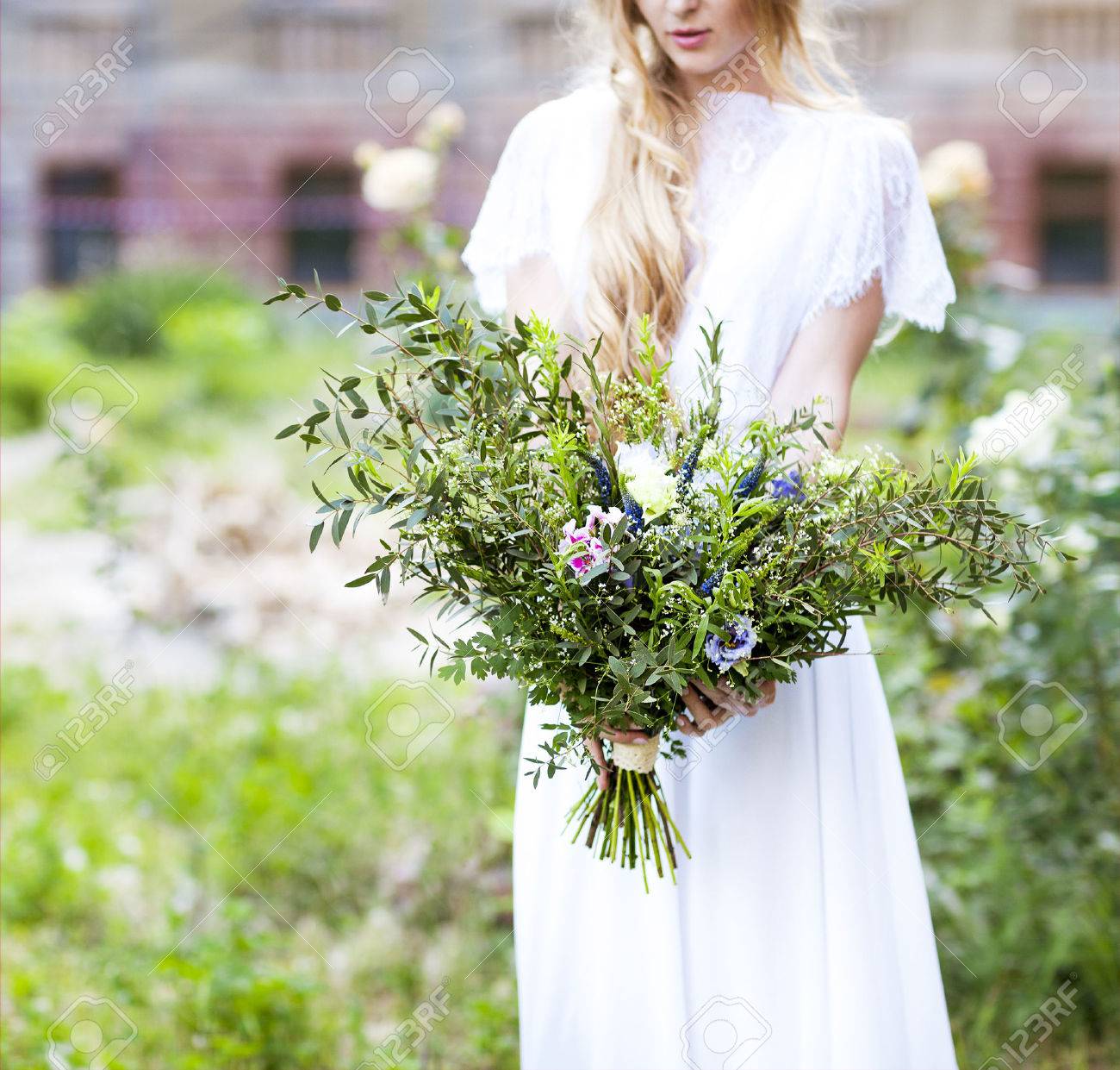 Beautiful Wedding Bouquet In The Hands Of The Bride Bouquet