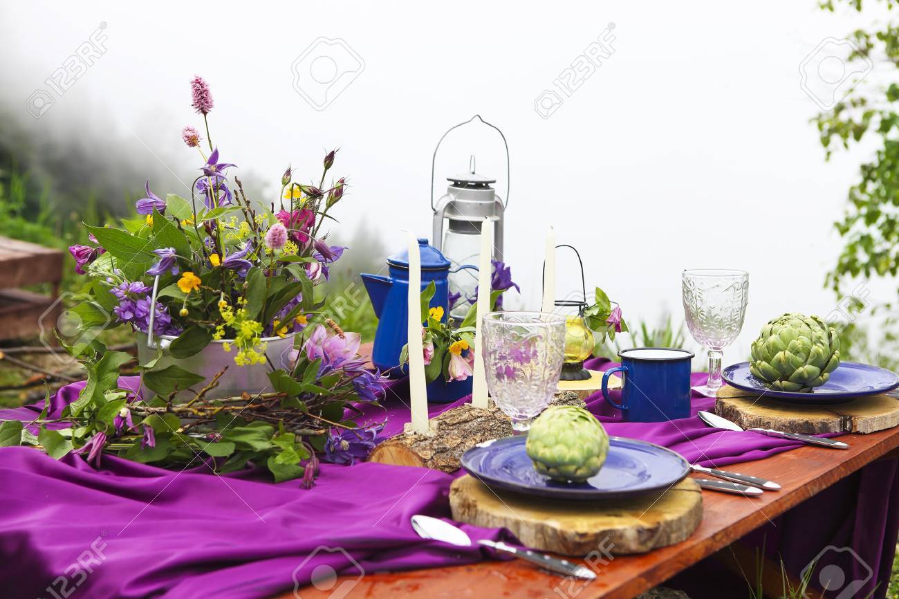 Wedding table setting decorated in rustic style. Mountains view - 71158965 Wedding table setting decorated in rustic style. Mountains view - 71158965