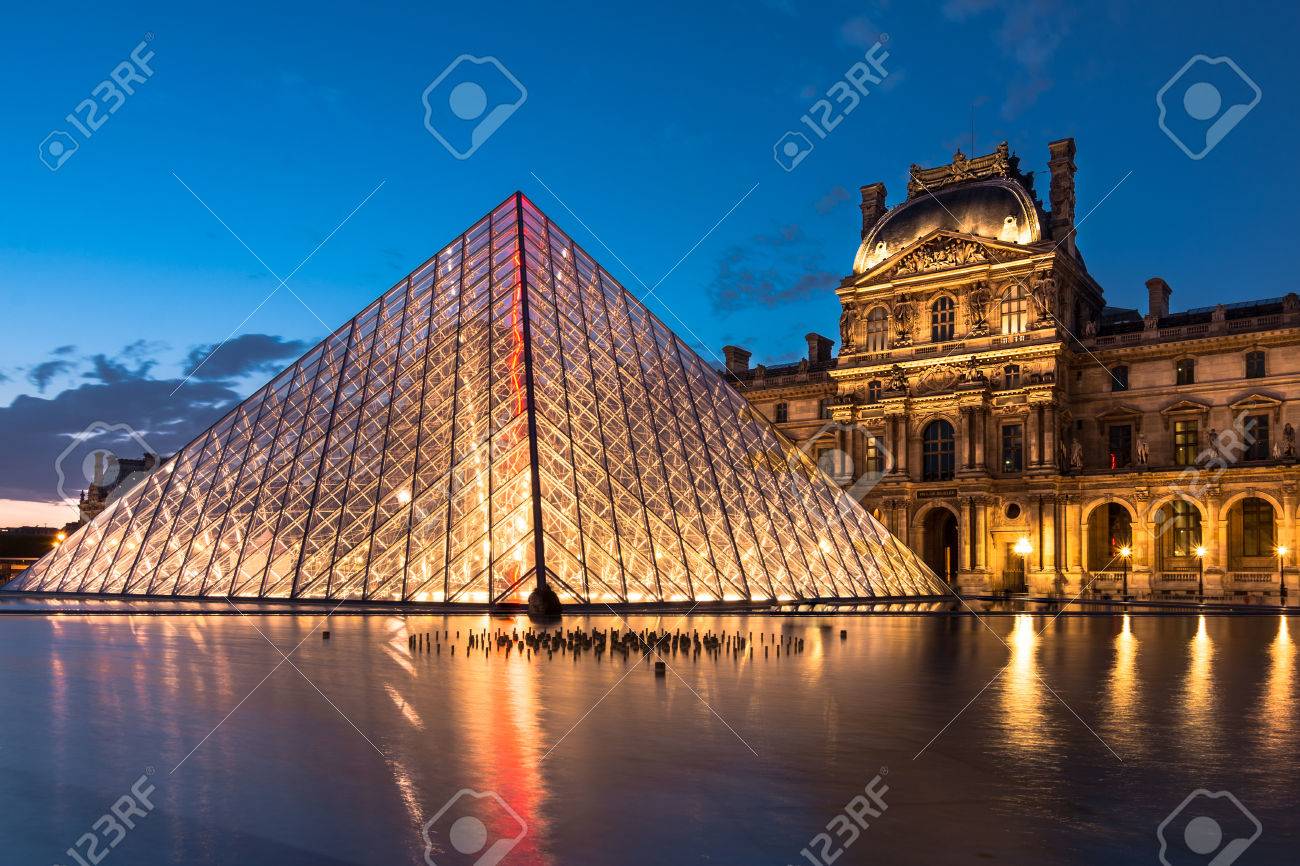 the louvre paris at twilight one of the major tourist attractions