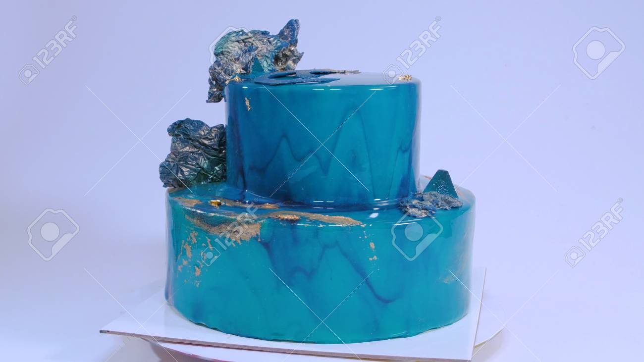 Mousse Cake Decorated In Marine Style Covered With Blue Mirror