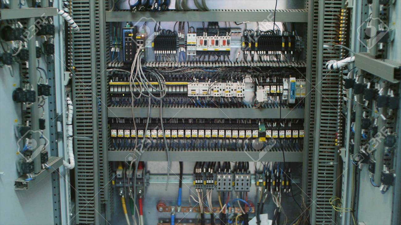 wires in a box of distribution of an electricity clip electrical Electrical Fuses Small to Largest stock photo wires in a box of distribution of an electricity clip electrical panel with fuses and contactors several contactors arranged in a row in an