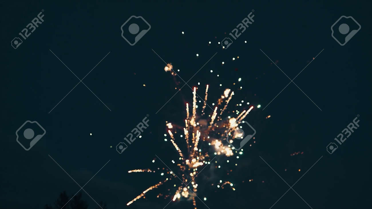 Bottom view of a dark blue night sky and exploding fireworks. Video. Blurred shining lights of fireworks, concept of celebration. - 170311837 Bottom view of a dark blue night sky and exploding fireworks. Video. Blurred shining lights of fireworks, concept of celebration. - 170311837