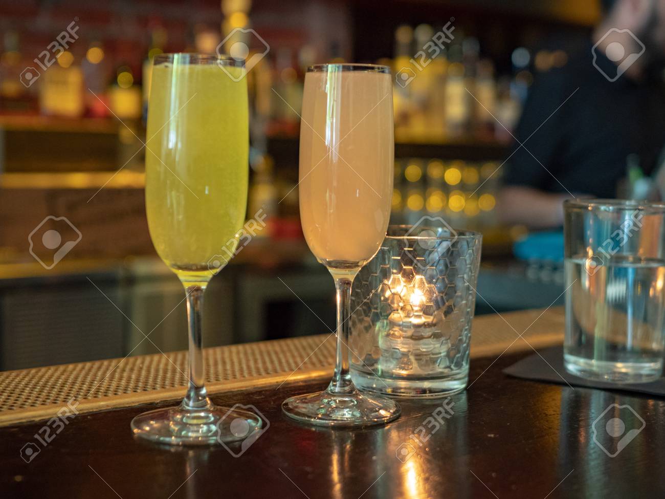 Two Wineglasses Filled With Mimosa Drinks Sitting On A Bar Counter Stock Photo Picture And Royalty Free Image Image 101097258
