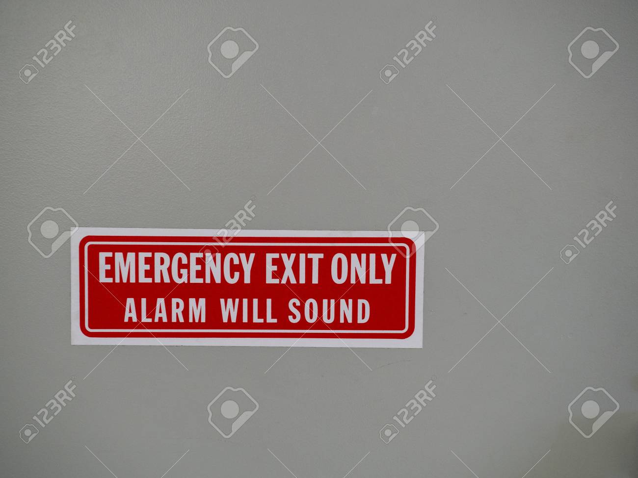 Emergency Exit Only Alarm Will Sound Sign Posted On A White Stock Photo Picture And Royalty Free Image Image